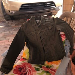 A dark green jean jacket